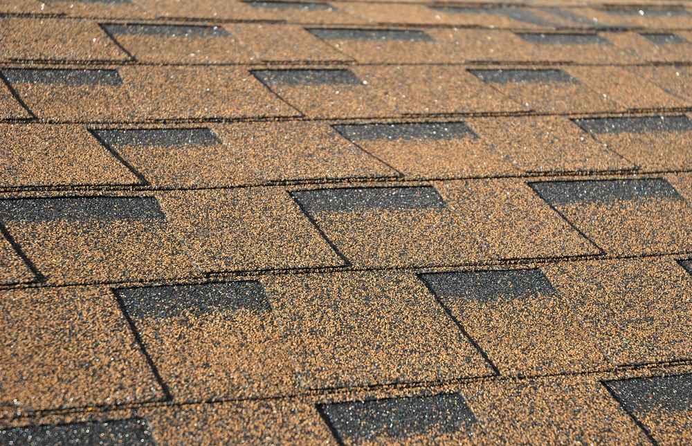 Brown asphalt shingle roofing system